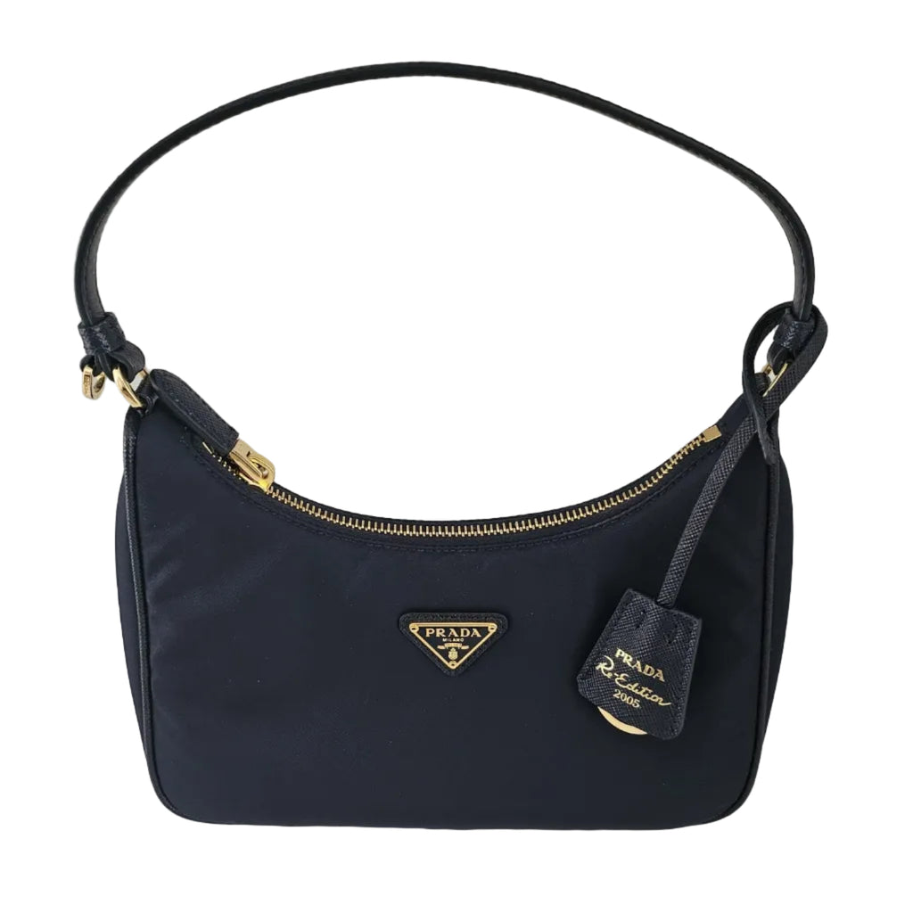 Pre-loved Prada Re-Edition 2005 nylon shoulder bag in black, one-of-one designer find available at Toteville.